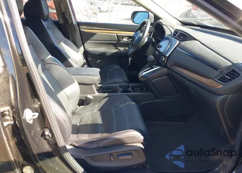 2018 Honda Cr-V Touring z USA, uszkodzony, nr VIN 7FARW2H91JE088570